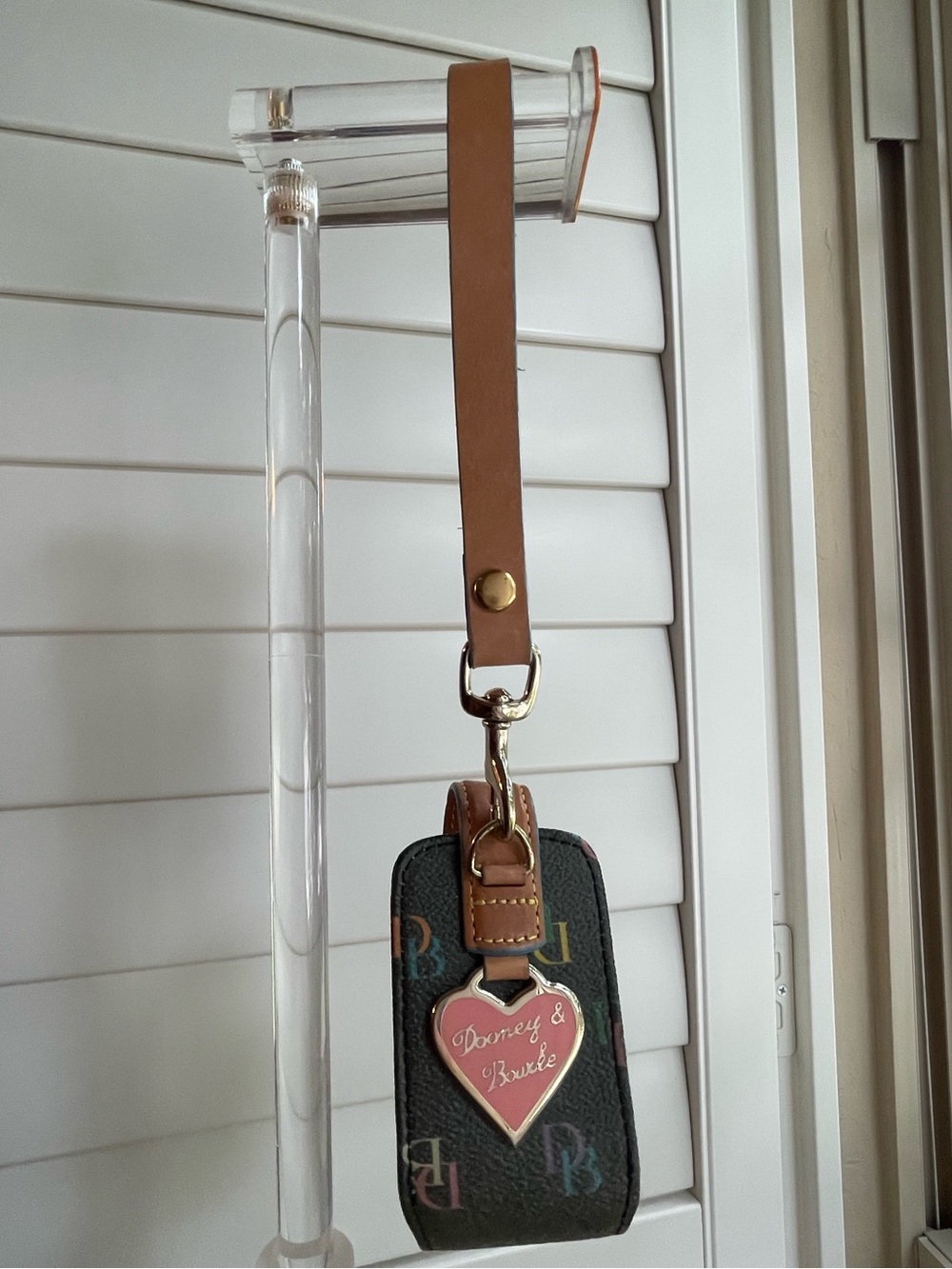 Dooney & Bourke Y2K-era cell phone case , hand sanitizer or bag charm